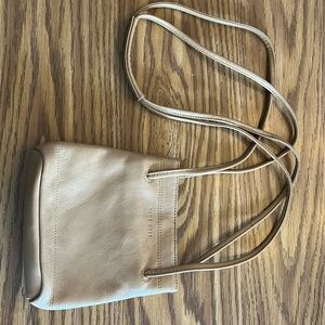 Small tan Nine West crossbody purse.